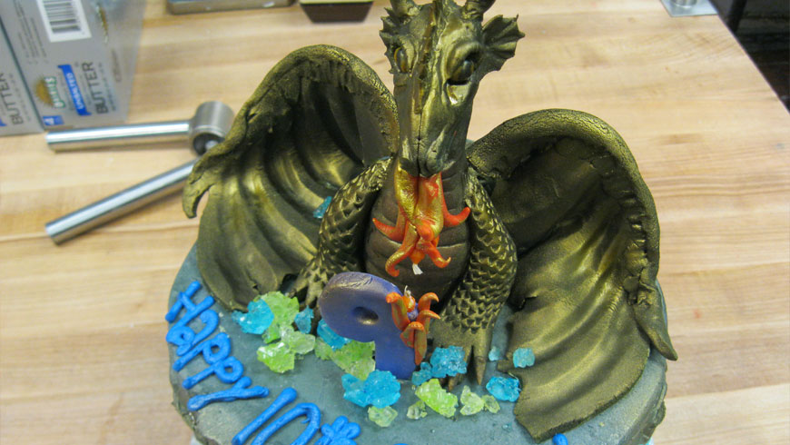A dragon themed birthday cake.