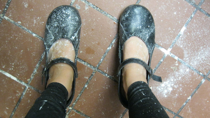 Emily's feet covered in flour!